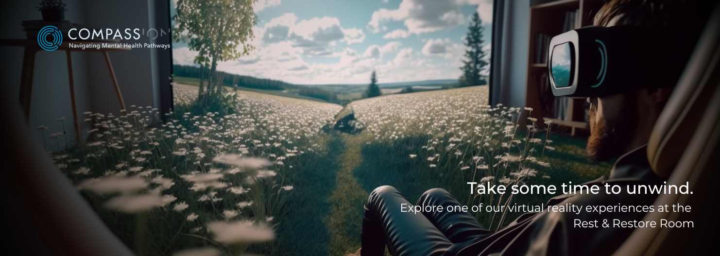 Person wearing VR headset relaxing in front of a rural scene